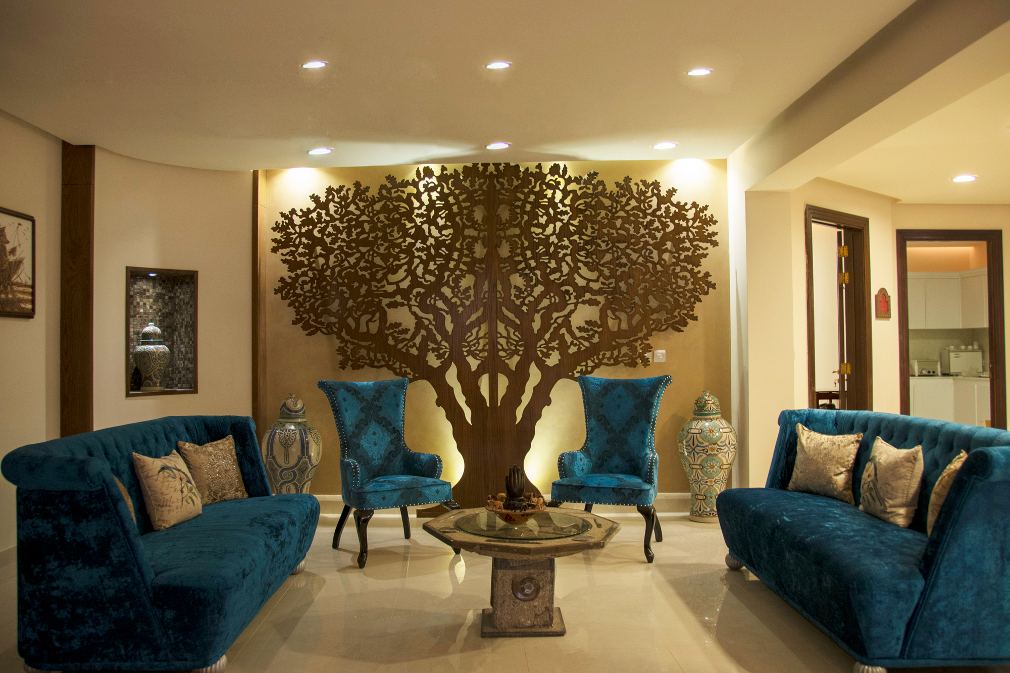 Elegant Hot Stone Spa lounge with tree-of-life artwork